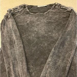 Cato top size S with crochet shoulders and black rhinestones.